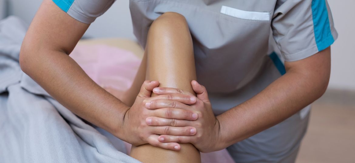 Woman receiving a leg massage on spa therapy